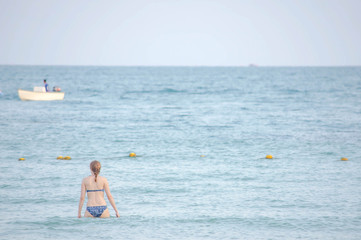 The image behind woman wearing a swimsuit background sea.