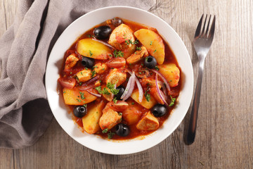 potato, veal, tomato sauce and olive