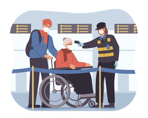 Health worker points a temperature gun to passengers. Screening for coronavirus at airport