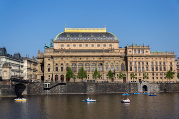 Obraz premium Prague panorama with National Theatre on the bank of Vltava River, Prague, Czech Republic, sunny summer day