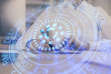 Multi exposure of hands making notes with digital coding icons. Computer learning concept.