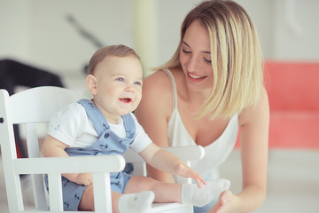 cheerful healthy baby smiling / portrait of a small child, boy little son cheerful health