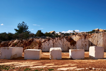 marble blocks at abandoned marble quarry in the sunny day