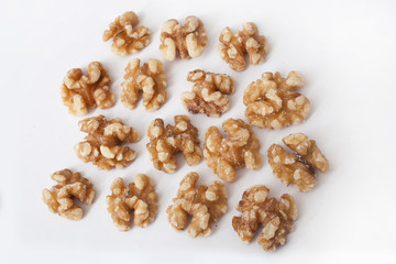 Walnuts against a white background