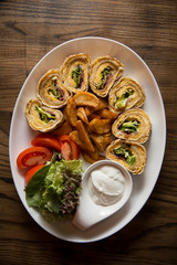 Omelette rolls on the table