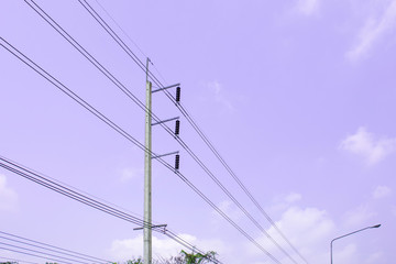 Electricity pole against blue sky clouds, Transmission line of electricity to rural, High voltage...