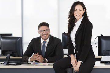 Business man and woman in office