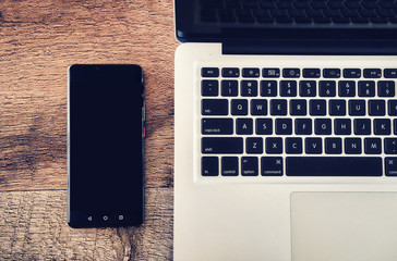 Modern smartphone and laptop computer 