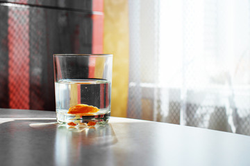 glass of wine on table in living room