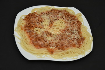 Spaghetti bolognese on a white plate,Spaghetti Recipes 