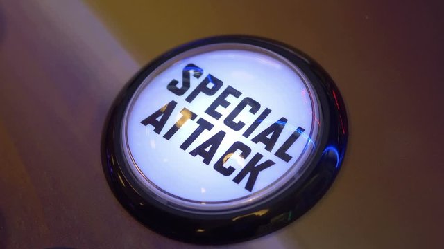 Close Up of finger pushing flashing special attack button in 4K Slow motion 60fps 