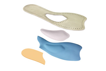 Isolated orthopedic insole on a white background. Treatment and prevention of flat feet and foot diseases. Foot care, comfort for the feet. Wear comfortable shoes. Medical insoles.