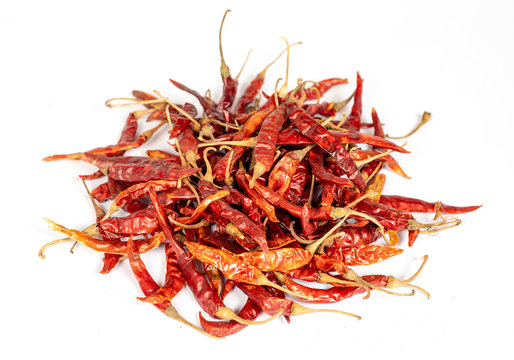 Dried chilli on a white background.