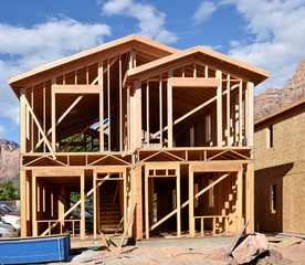 Obraz premium Wood frame house under construction.