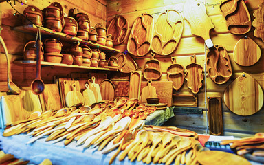 Wooden kitchen utensils at Christmas Market in Riga Latvia reflex
