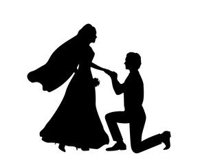Silhouette of groom kneeling puts ring on the bride