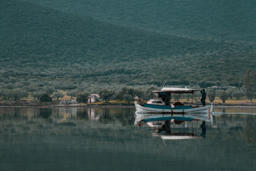 Fototapeta na wymiar Fisherman on his boat