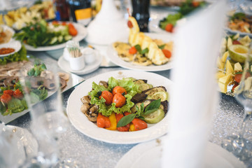 grilled vegetables on green leaves