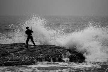 Obraz premium Fisherman at Beach