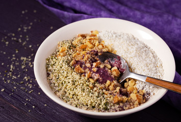 Acai Smoothie Bowl Topped with Coconut, Walnuts and Hemp Seed