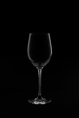 Empty transparent wine glass in ther black and white background