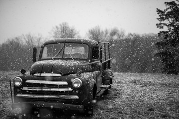 old car in snow - Powered by Adobe