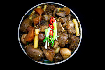 Korean chicken stew with soy sauce, glass noodle, rice cake and vegetables