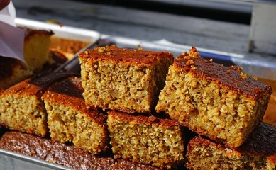 Slices of Greek honey cake with walnuts (karidopita)