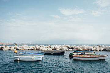 Obraz premium Boats at the seafront of Naples the seafront of Naples