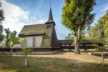 Fototapeta na wymiar Wooden church Koci in the middle of a park, Chrudim, Czech Republic