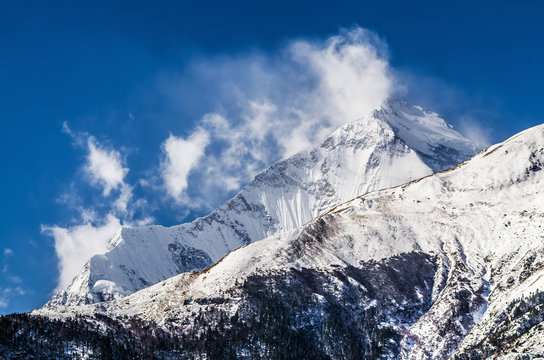 Mt. Dhaulagiri summit in sunny winter day. Kali Gandaki valley, Annapurna circuit / Jomsom trek, Nepal.