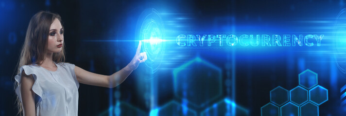 Business, Technology, Internet and network concept. Young businessman working on a virtual screen of the future and sees the inscription: Cryptocurrency