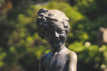 Fototapeta na wymiar stone statue girl