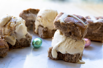 Hot cross buns ice cream bun sandwiches with easter eggs