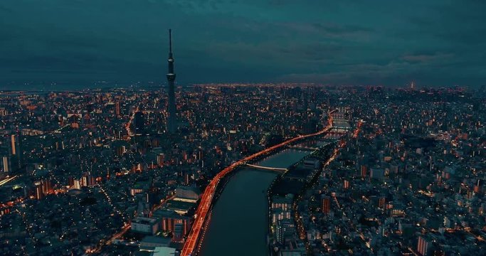 Aerial shot of Tokyo city at dusk during coronavirus fight, Japan