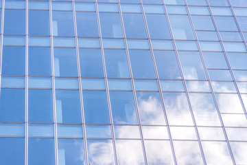 underside panoramic and perspective view to steel blue glass high rise building skyscrapers, business concept of successful industrial architecture