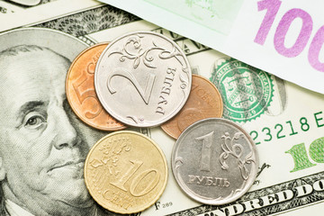 currency paper, banking and finance, saving money. Dollars, euros and rubles. Falling and rising...