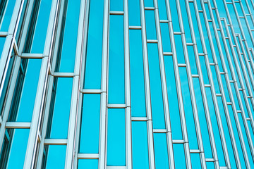 Obraz premium underside panoramic and perspective view to steel Tiffany blue glass high rise building skyscrapers, business concept of successful industrial architecture