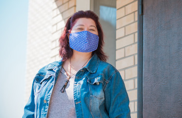 Virus concept. Woman in cotton fashionable mask, risk for health, pneumonia, epidemic 