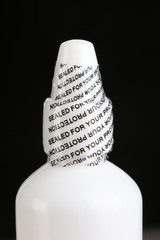 Tamper proof eye care bottle with protection seal