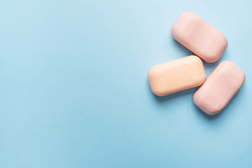 Natural soap on a blue pink background. Flat lay the concept of Spa cleanliness of hands. copy space