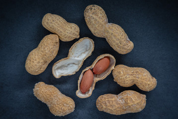 Peanut in a shell and cleared on a neutral background