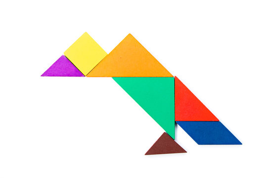 Color wood tangram puzzle in vulture bird shape on white background