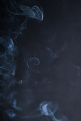  Smoke in motion on dark background