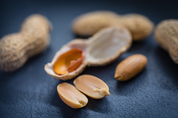 Peanut in a shell and cleared on a neutral background