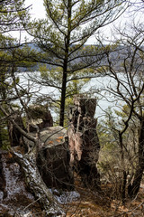 Rock formations on the cliffs above a lake along east bluff trail at a state park in Wisconsin