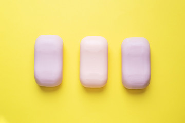 Natural soap on a yellow background. Flat lay the concept of Spa cleanliness of hands. copy space