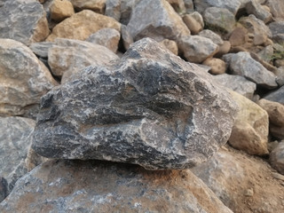 Limestone is sedimentary rock composed primarily of calcium carbonate in the form of the mineral calcite.