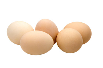  five cream-colored chicken eggs on a white background