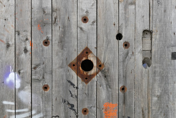 Old wooden boards. Background natural wooden boards. Texture of old unpainted wooden planks. Vertical arrangement of shabby wooden boards.
